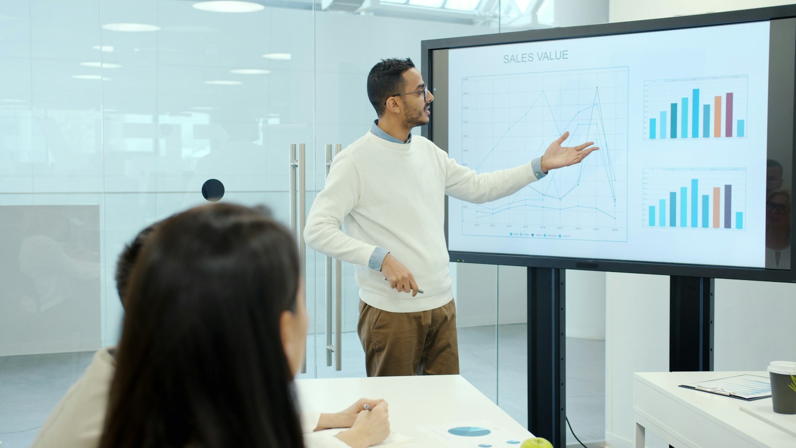 Executives reviewing a data presentation in a boardroom